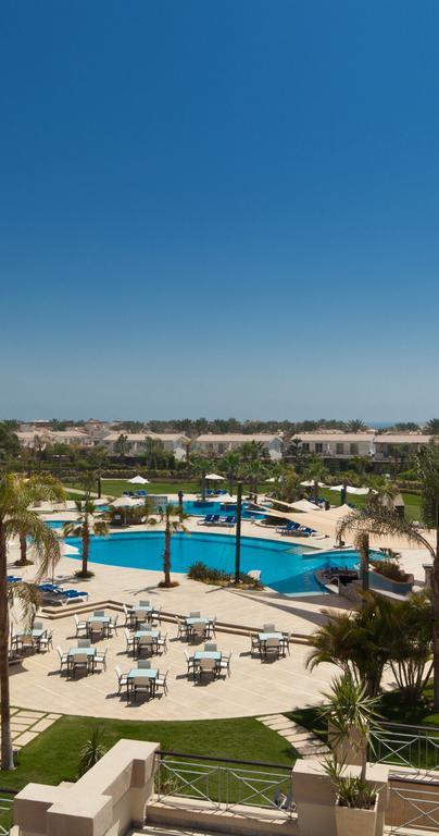 Jaz Little Venice Golf Resort Ain Sukhna Ngoại thất bức ảnh View of the pool at the Al Hamra Golf Club